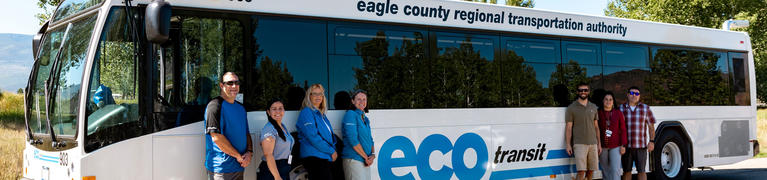 EVTA Employees standing in front of a big bus